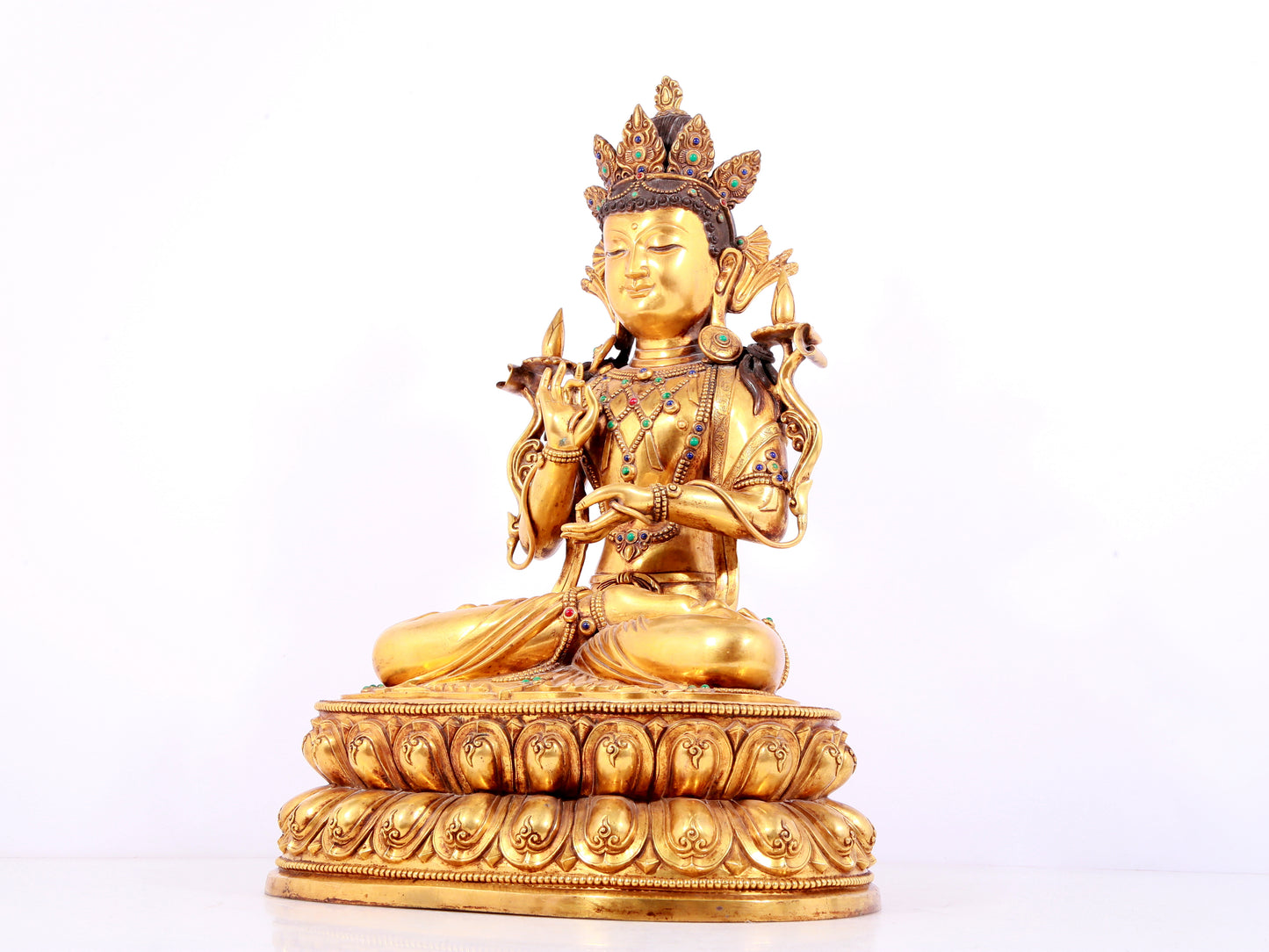 A solemn gilt bronze statue of Bodhisattva inlaid gems