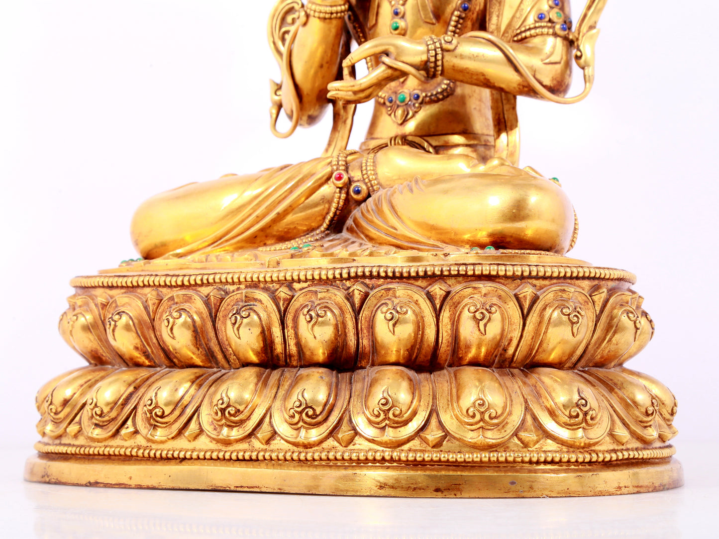 A solemn gilt bronze statue of Bodhisattva inlaid gems