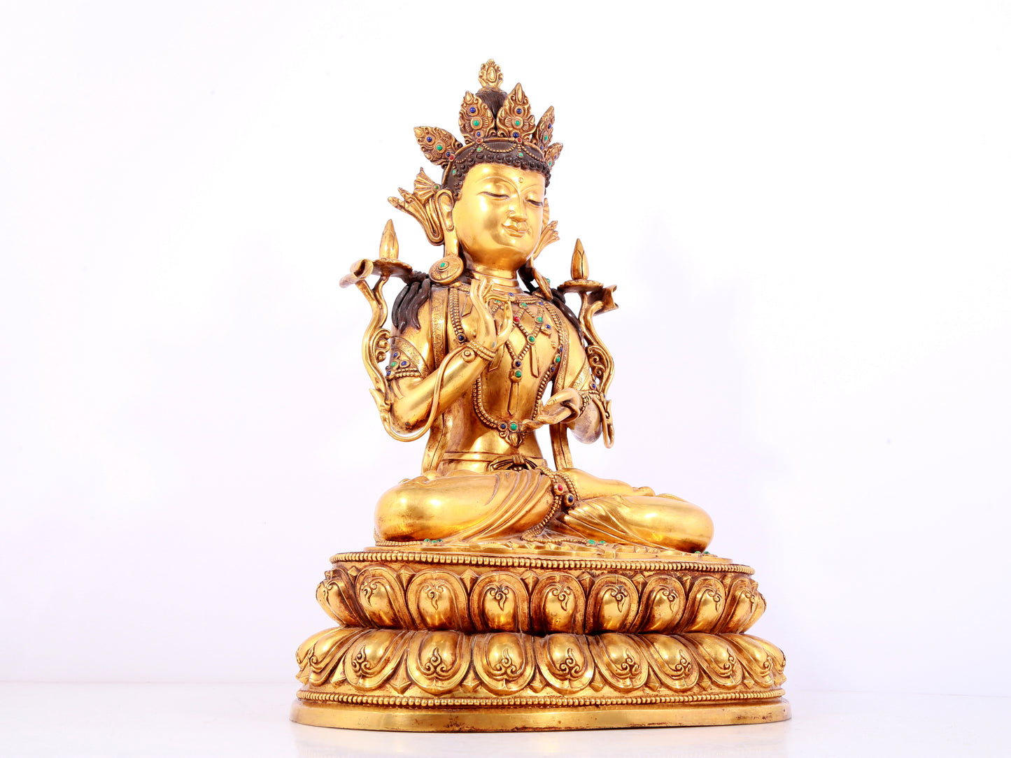 A solemn gilt bronze statue of Bodhisattva inlaid gems