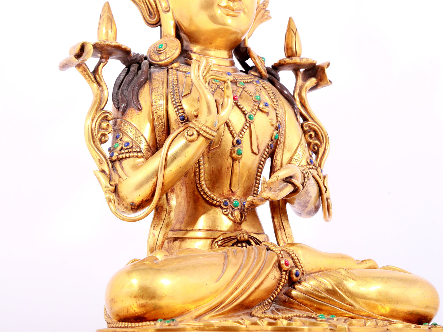 A solemn gilt bronze statue of Bodhisattva inlaid gems