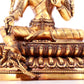 A solemn gilt bronze statue of green Tara