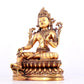 A solemn gilt bronze statue of green Tara