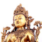 A solemn gilt bronze statue of green Tara