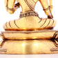 A solemn gilt bronze statue of green Tara