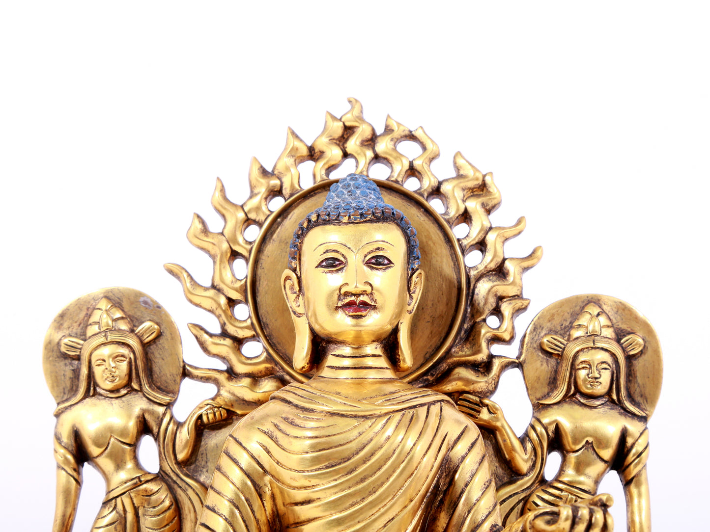 A solemn gilt bronze statue of Sakyamuni