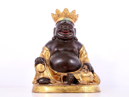 A solemn gilt bronze Maitreya statue