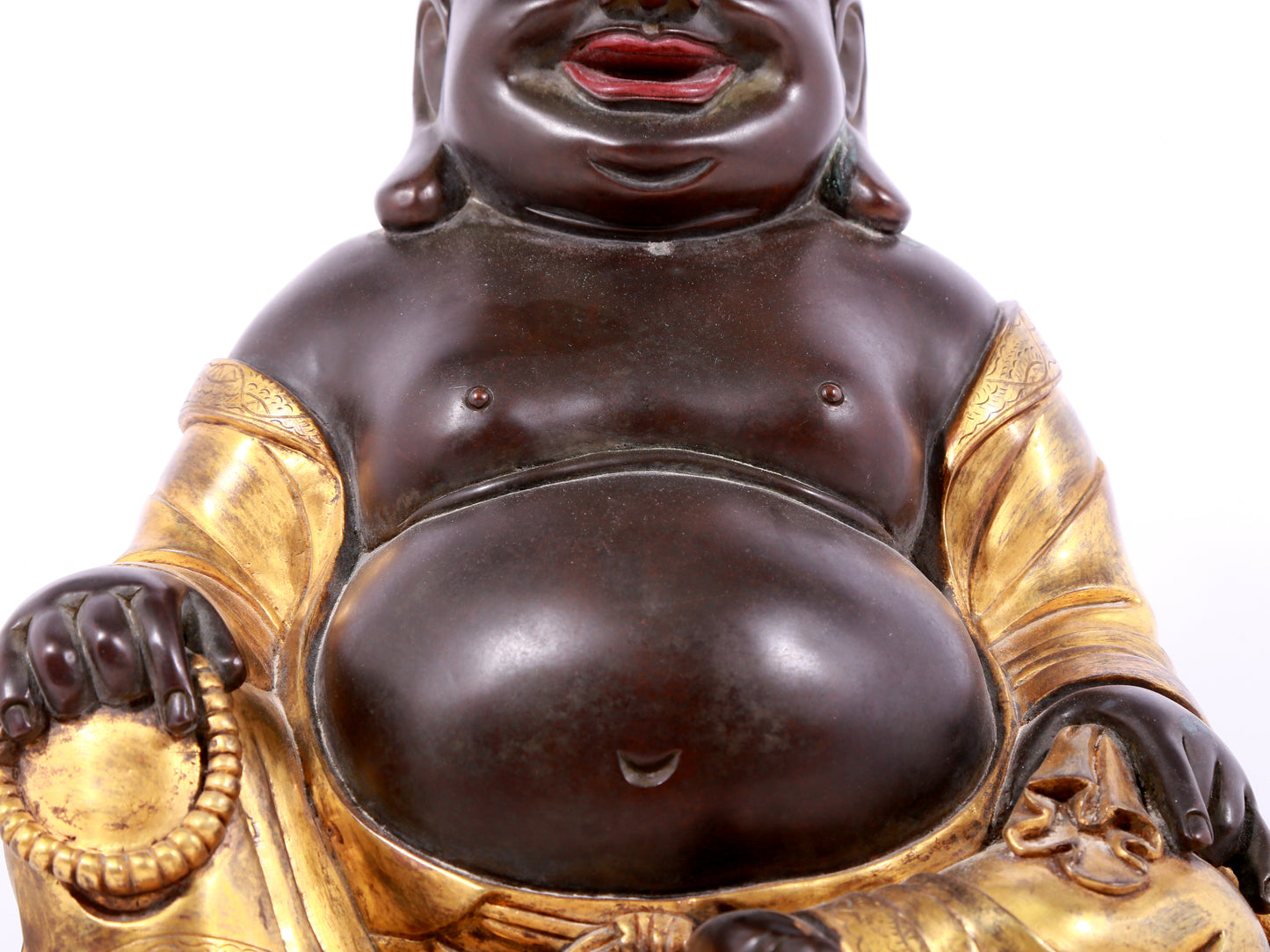 A solemn gilt bronze Maitreya statue