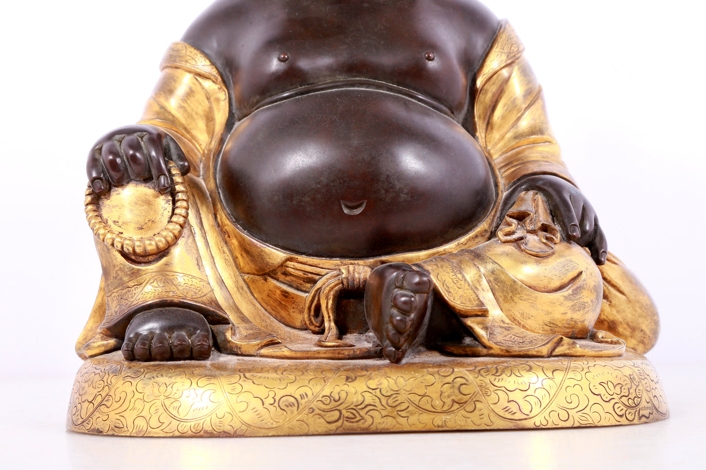 A solemn gilt bronze Maitreya statue