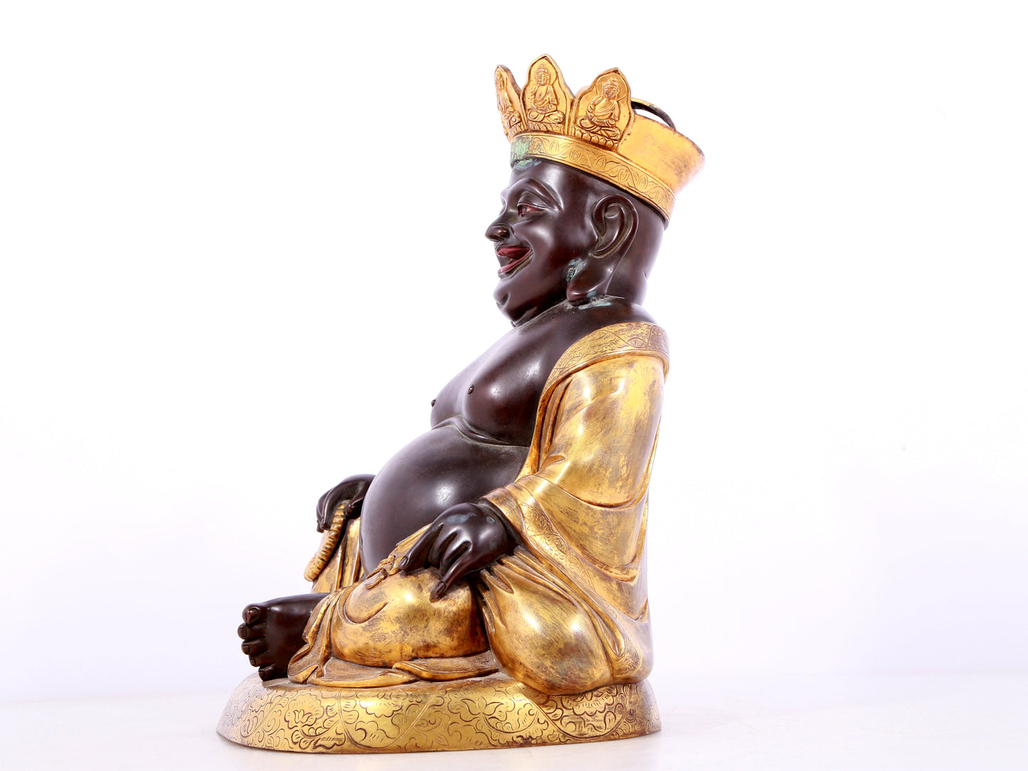 A solemn gilt bronze Maitreya statue