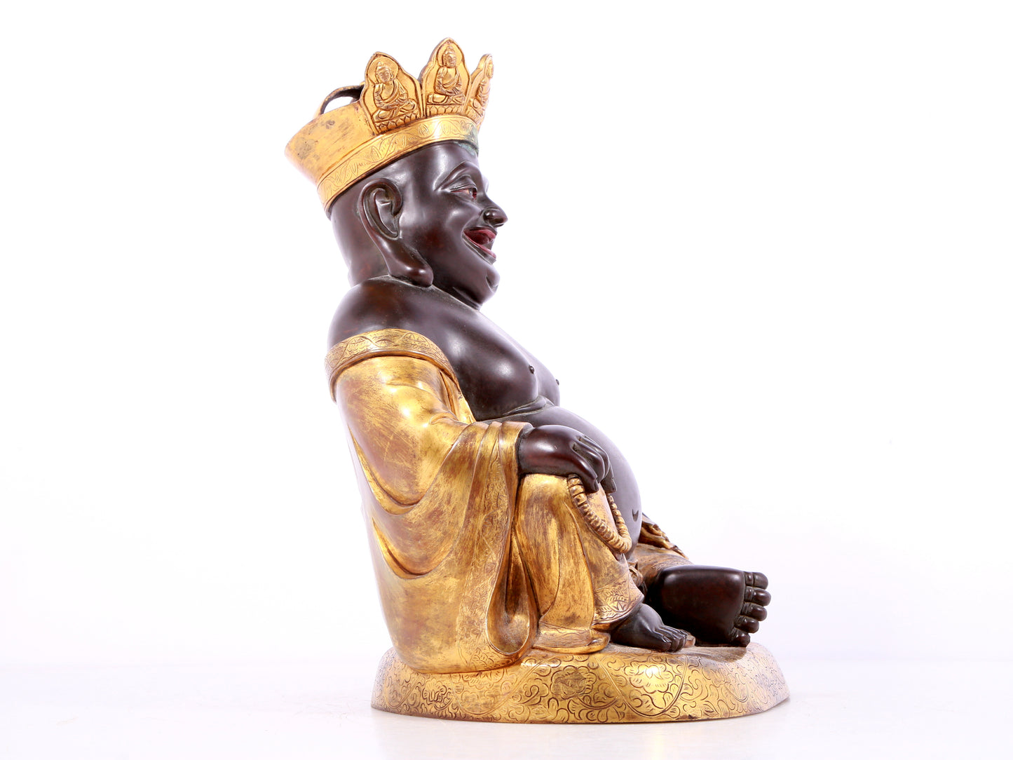 A solemn gilt bronze Maitreya statue