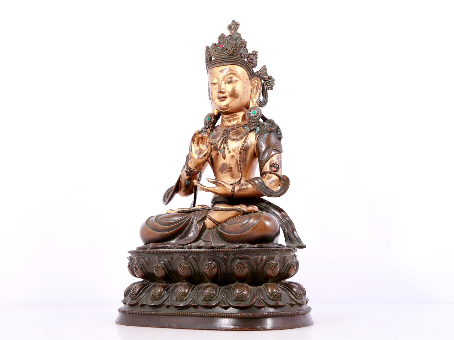 A solemn gilt bronze statue of Bodhisattva