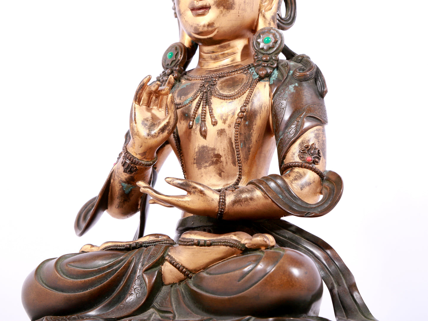 A solemn gilt bronze statue of Bodhisattva