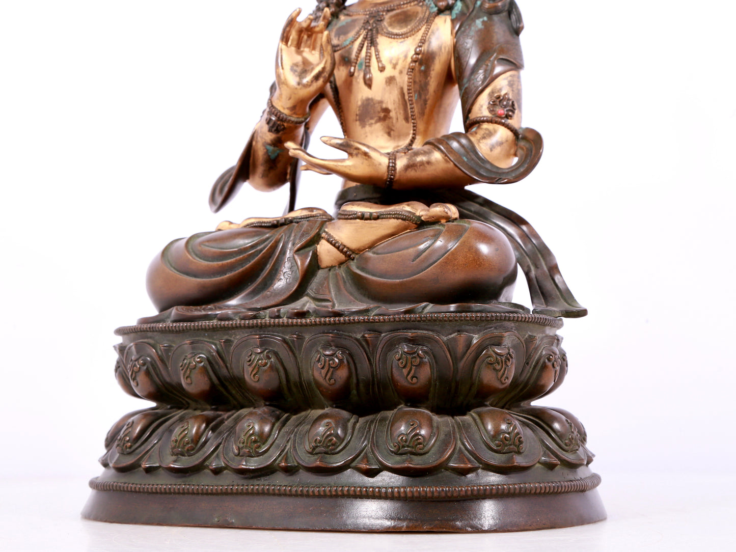 A solemn gilt bronze statue of Bodhisattva