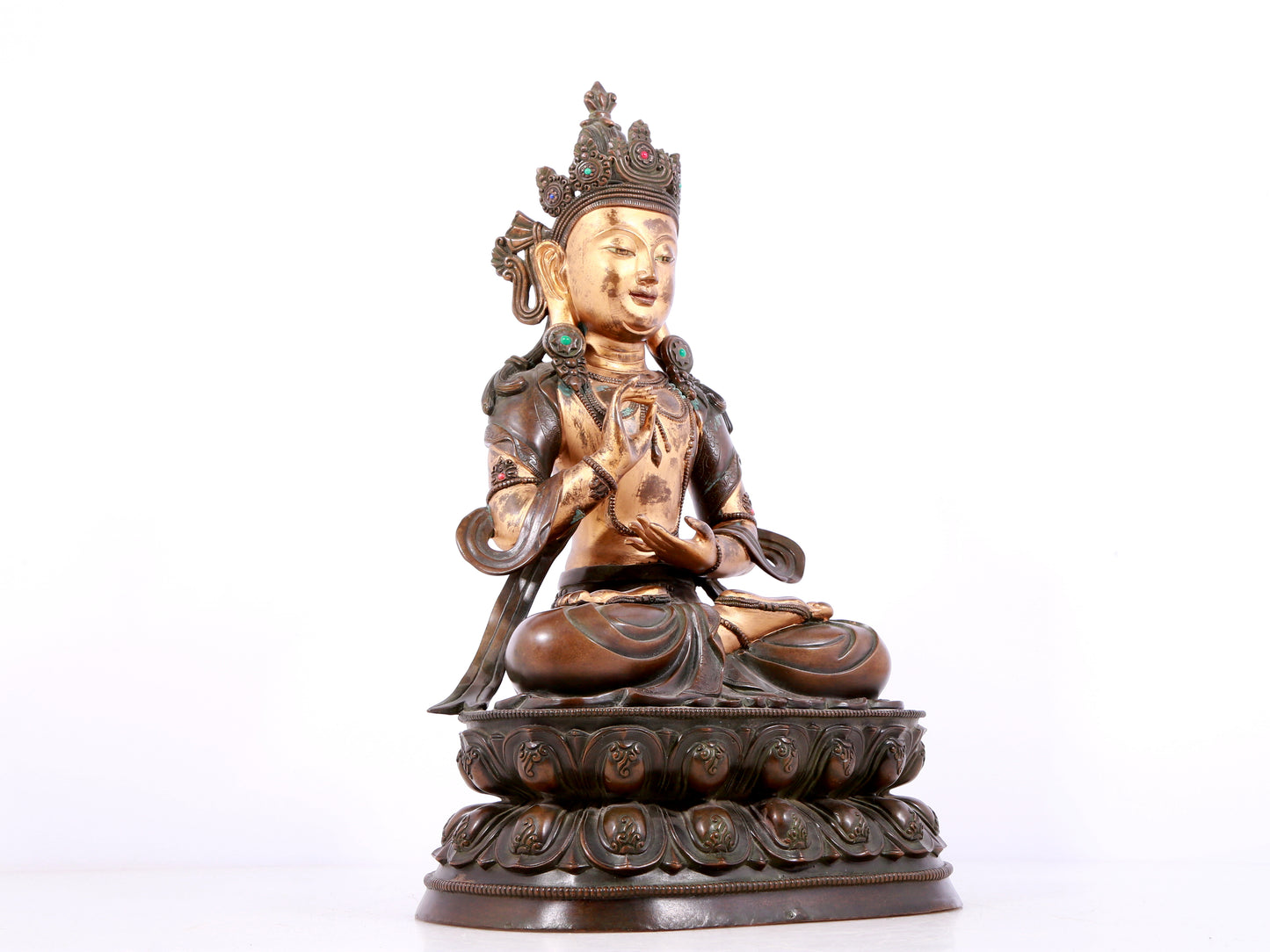 A solemn gilt bronze statue of Bodhisattva