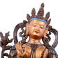 A solemn gilt bronze statue of green Tara