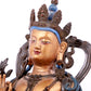 A solemn gilt bronze statue of green Tara