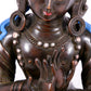 A solemn bronze Buddha statue