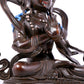 A solemn bronze Buddha statue