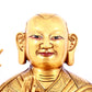 A solemn gilt bronze statue of guru