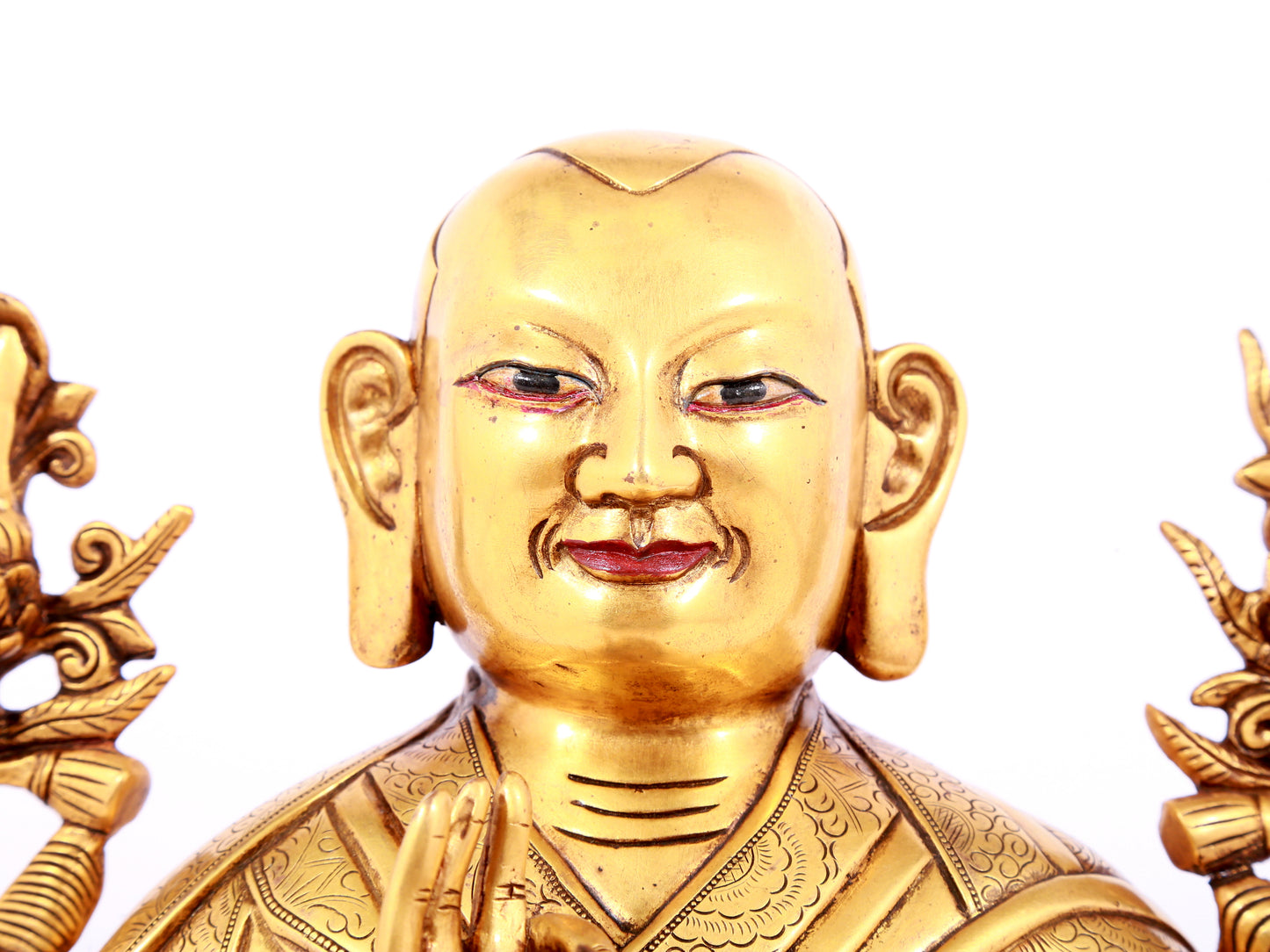 A solemn gilt bronze statue of guru