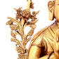 A solemn gilt bronze statue of guru