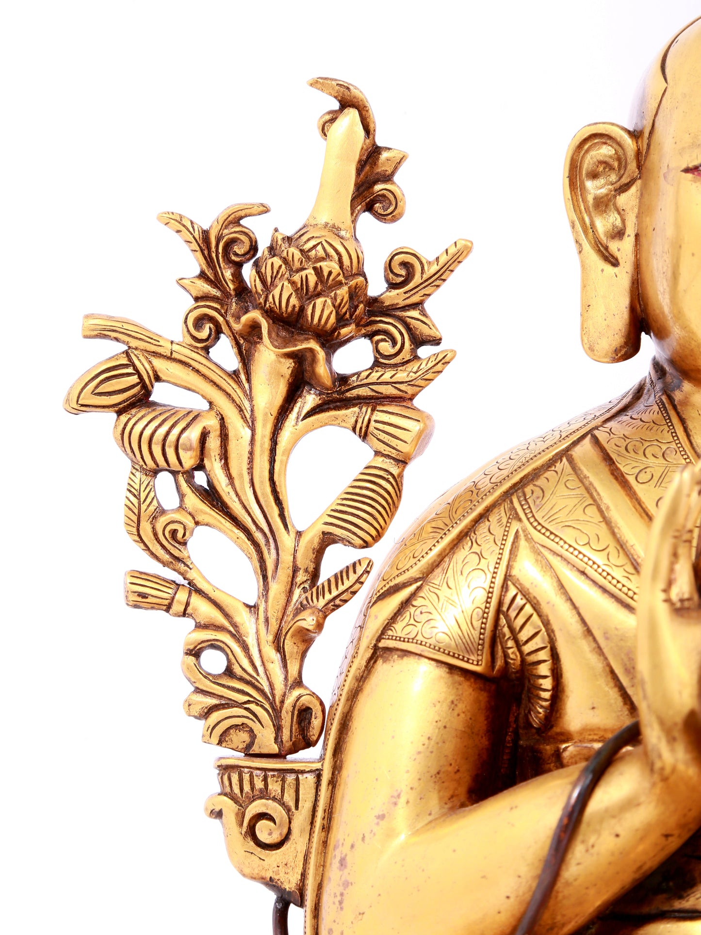 A solemn gilt bronze statue of guru