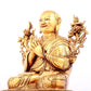 A solemn gilt bronze statue of guru