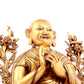 A solemn gilt bronze statue of guru