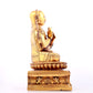 A solemn gilt bronze statue of guru