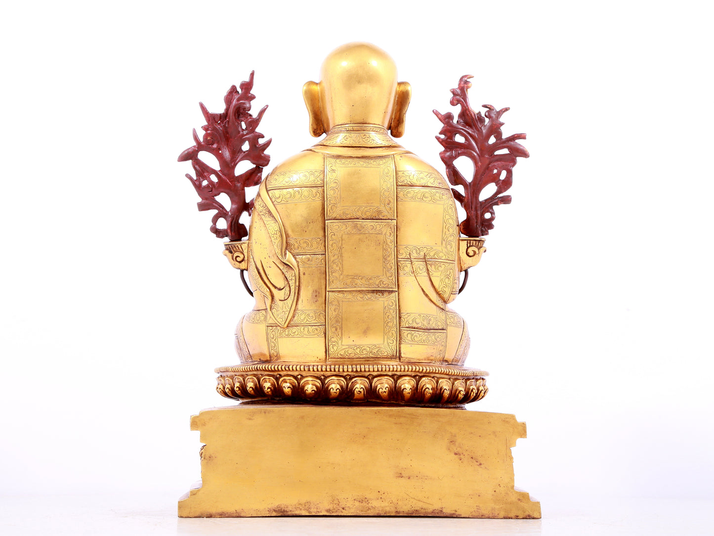 A solemn gilt bronze statue of guru