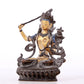 A solemn gilt bronze statue of Manjushri Bodhisattva