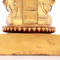 A solemn gilt bronze statue of guru