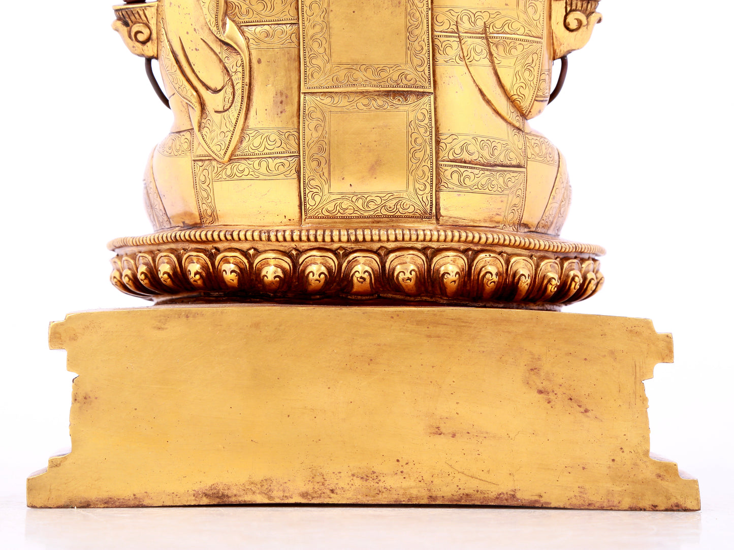 A solemn gilt bronze statue of guru