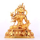 A solemn gilt bronze statue of green Tara