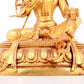 A solemn gilt bronze statue of green Tara