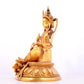 A solemn gilt bronze statue of green Tara