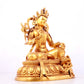 A solemn gilt bronze statue of green Tara