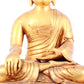 A solemn gilt bronze statue of Sakyamuni