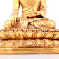 A solemn gilt bronze statue of Sakyamuni