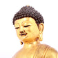 A solemn gilt bronze statue of Sakyamuni