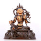 A solemn gilt bronze statue of green Tara