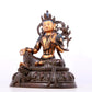 A solemn gilt bronze statue of green Tara