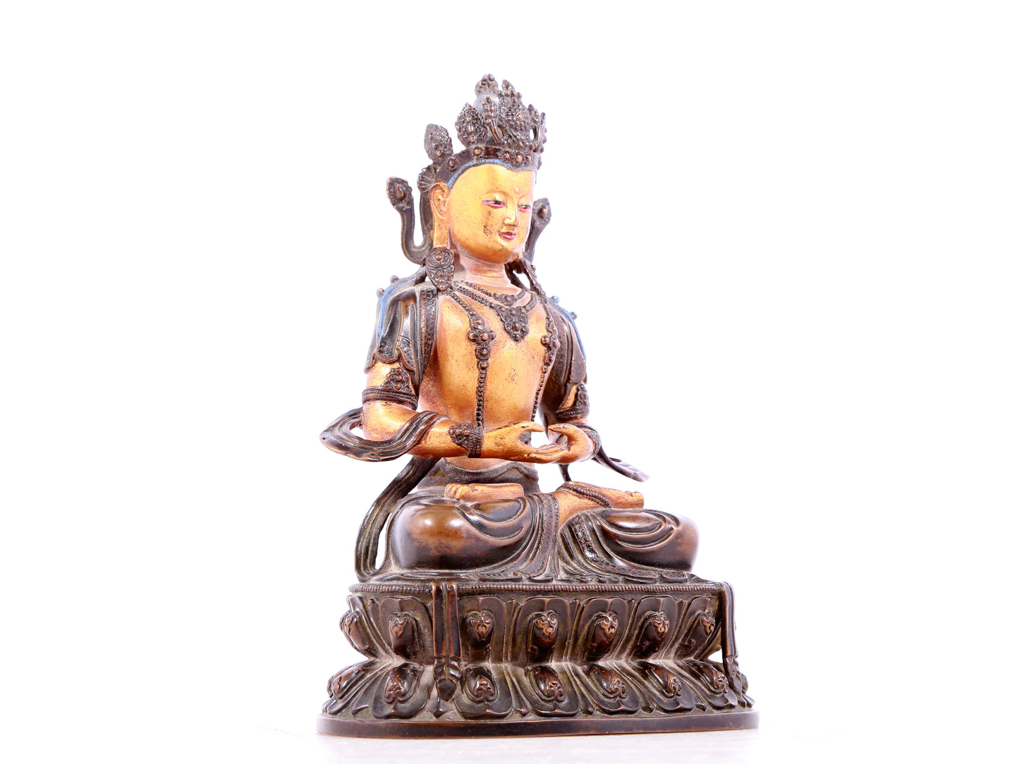 A solemn gilt bronze statue of Bodhisattva