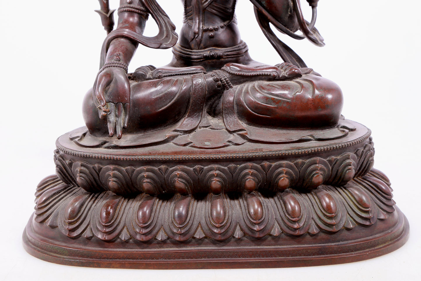 An Archaic Bronze Figure Of White Tara