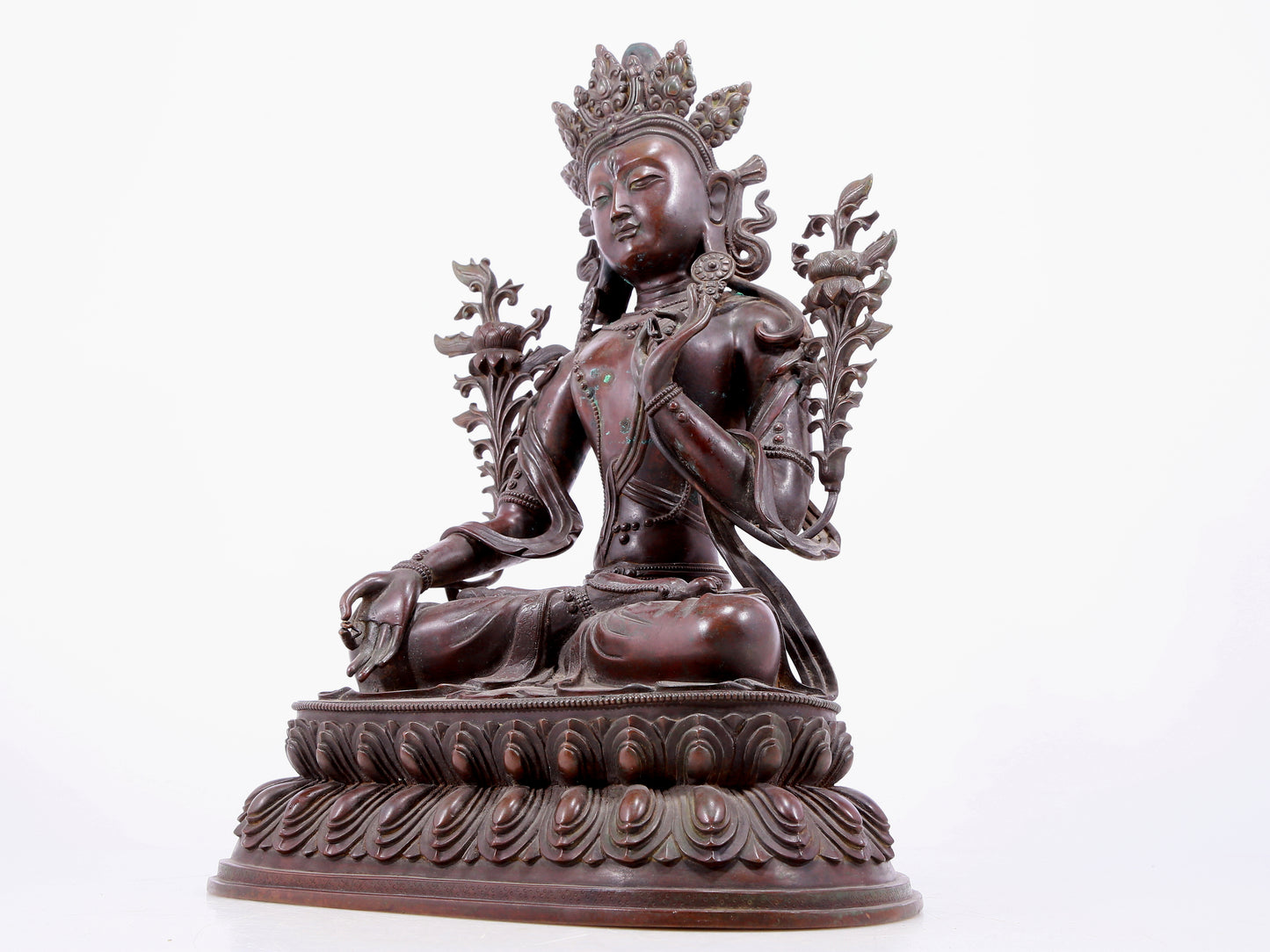 An Archaic Bronze Figure Of White Tara