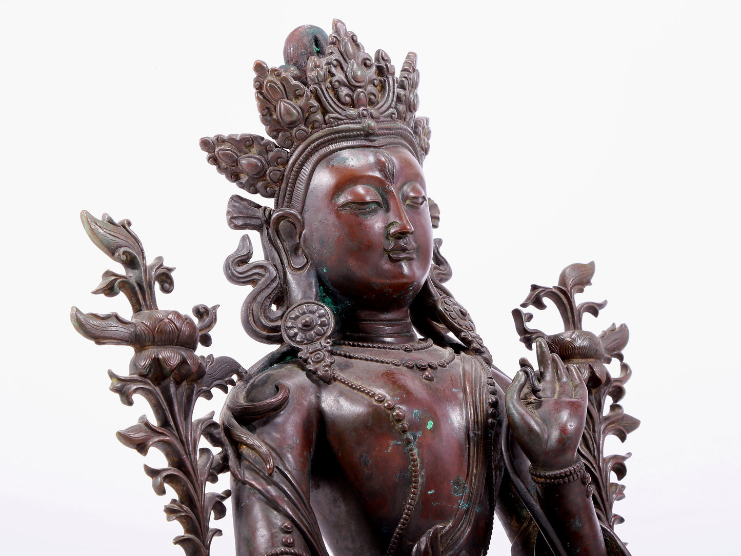 An Archaic Bronze Figure Of White Tara