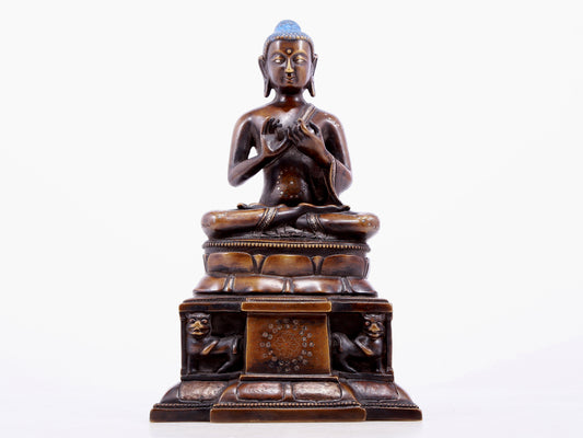 An alloy copper inlaid silver statue of Gautama Buddha