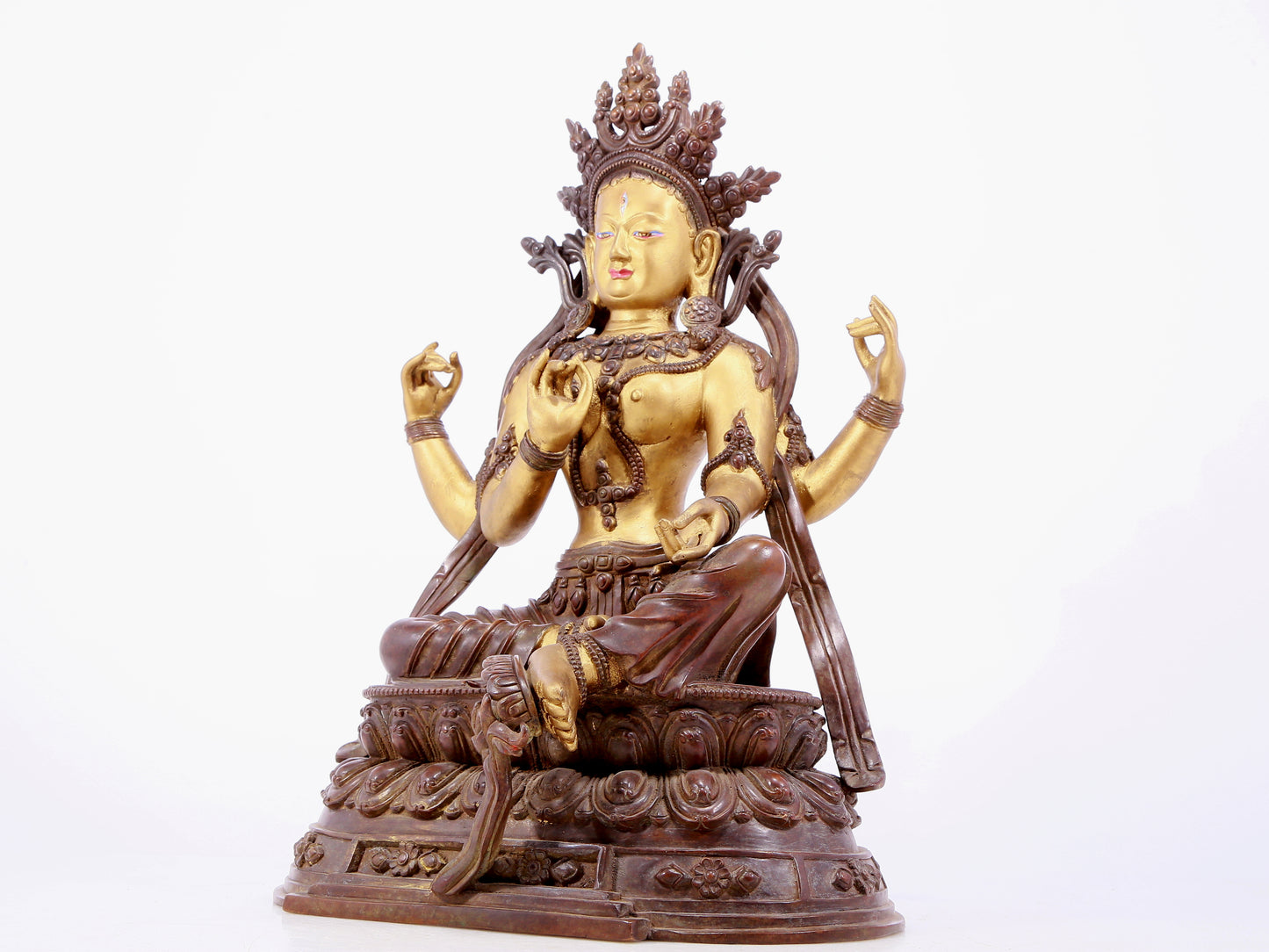 An Archaic Gilt-Bronze Figure Of Four-Armed Avalokiteshvara