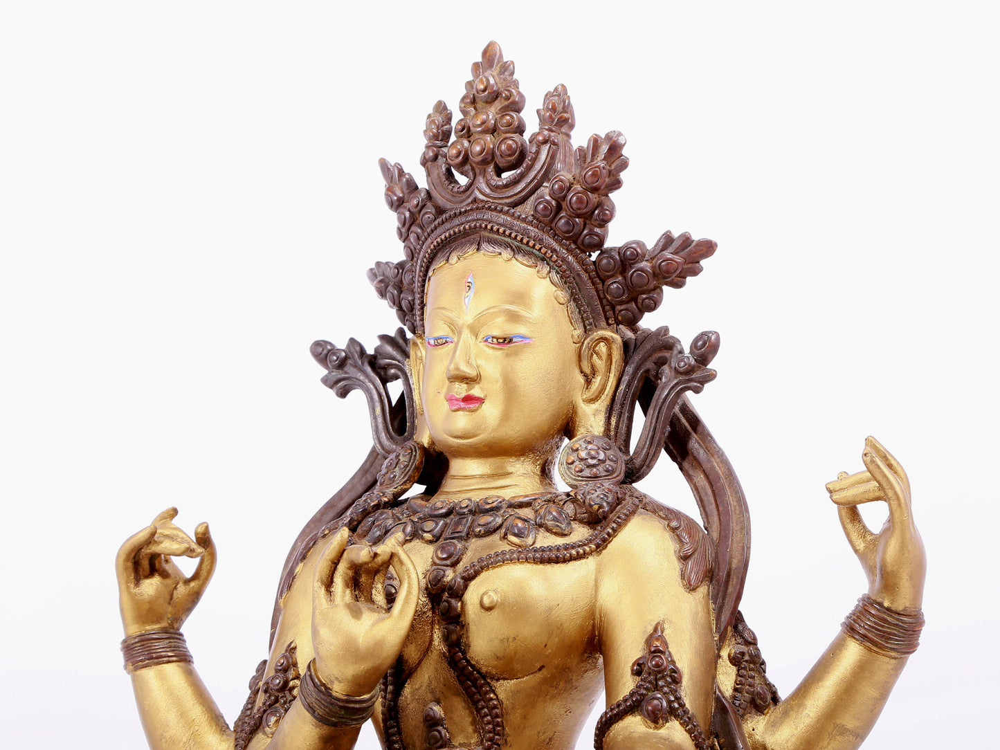 An Archaic Gilt-Bronze Figure Of Four-Armed Avalokiteshvara