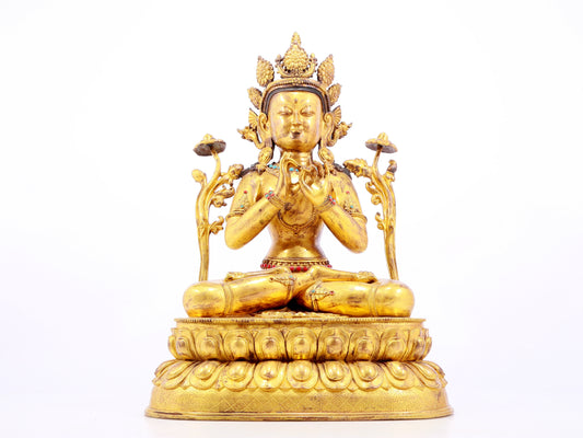 A gilt bronze statue of Tara inlaid with hundreds of treasures